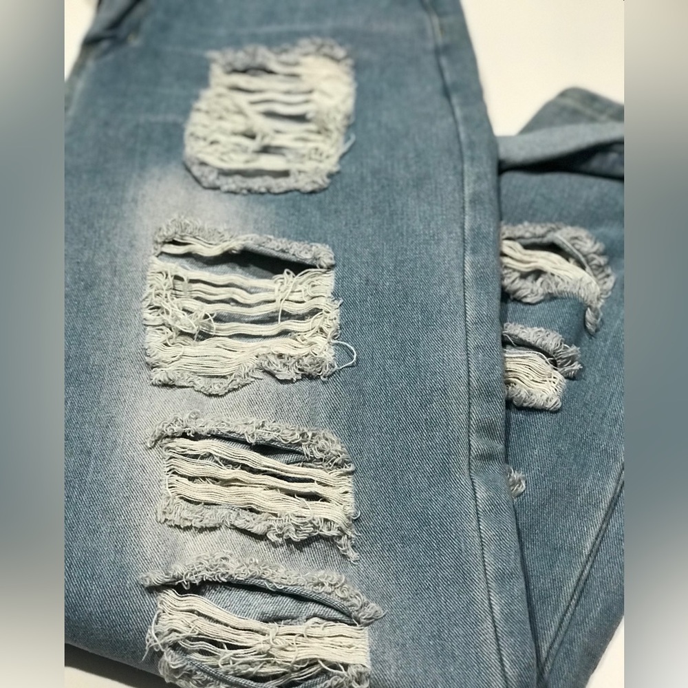 Distressed denim jeans. Size M. Excellent condition!